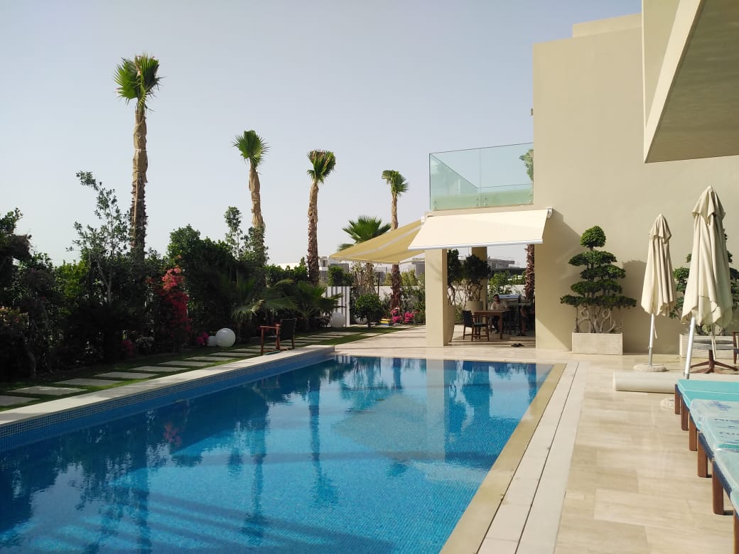 Complet pro awnings by a pool