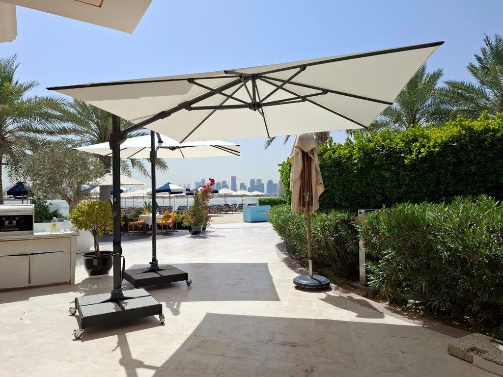 Fortano Umbrellas Installed at Raffles the Palm