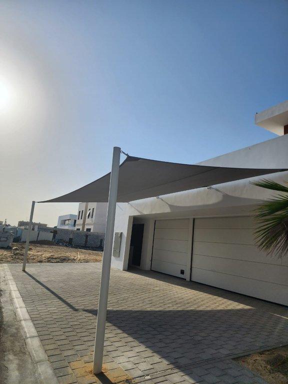 Tensioned Shade sail for Carport in Al Khawaneej